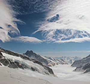 Unusual cirrus clouds viewed from the Jungfraujoch. Airflow over the mountains is thought to have casued these unusual cloud formations