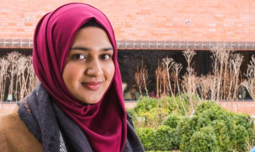 Student smiling at camera