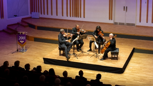 The Quatuor Danel perform on stage.