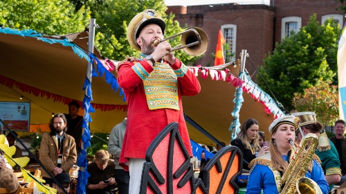 A member of Mr Wilson's Second Liners performs at Universally Manchester Festival.