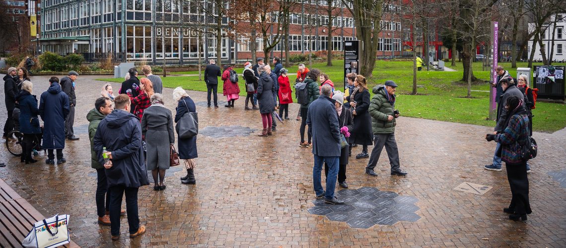 Guests read the stones at the Bicentenary Way installation.