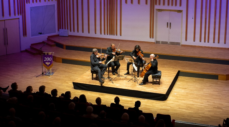 Quatuor Danel performing on stage.