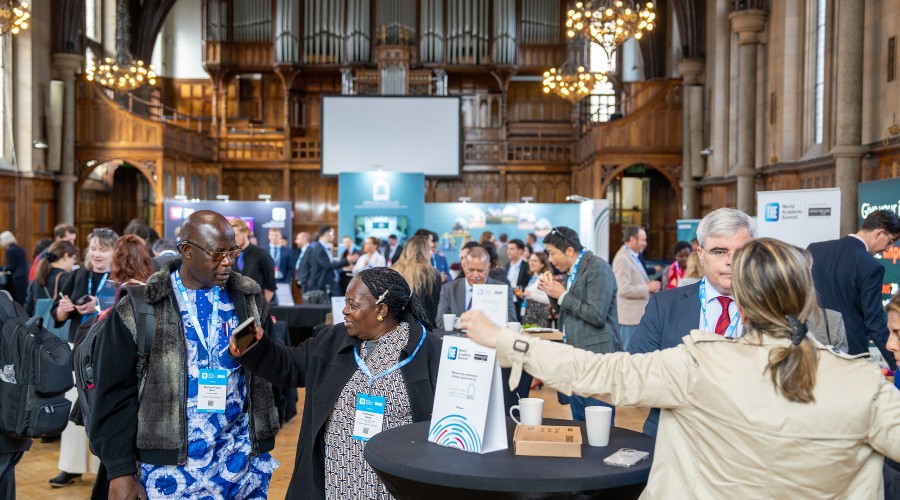 Delegates gather in Whitworth Hall.