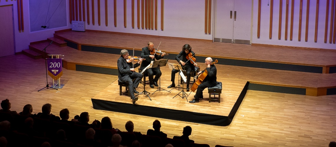 String quartet Quatuor Danel performing on stage.