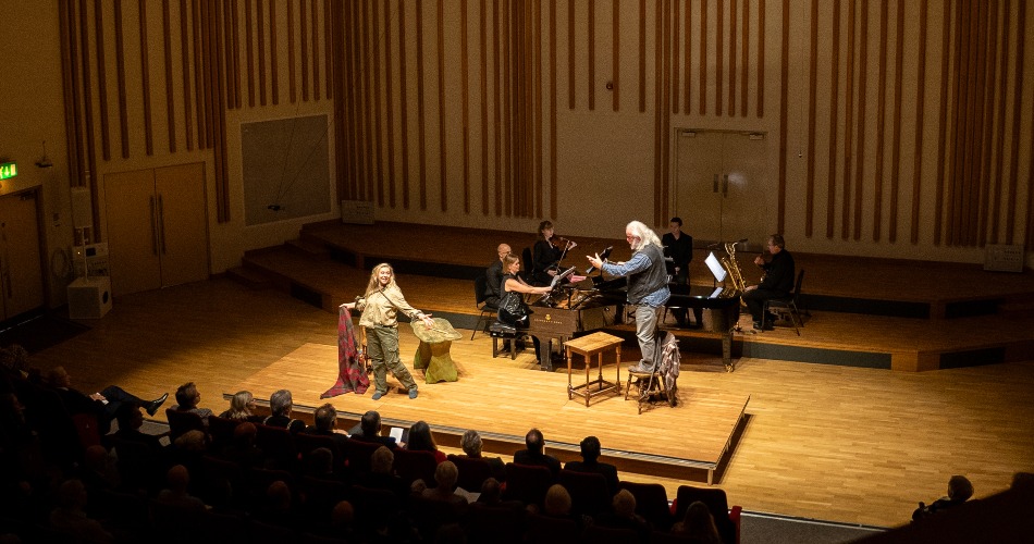 Sir John Tomlinson and Rozanna Madylus performing 'The Shackled King' on stage.