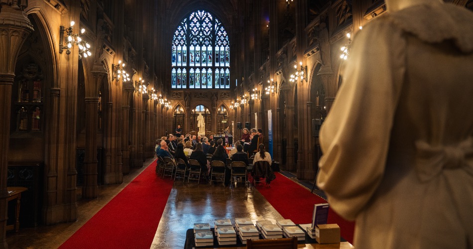 The event taking place in the John Rylands Research Institute and Library.