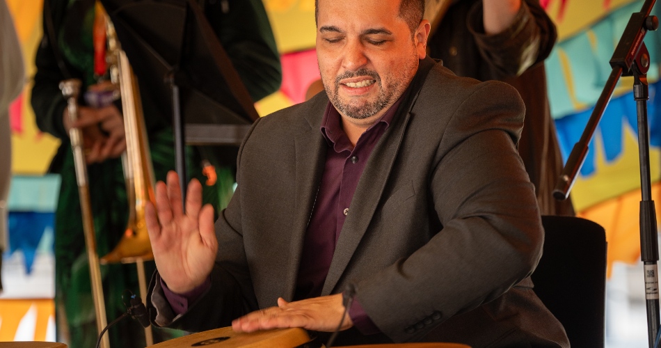 Carlos Maldonado plays the drums.