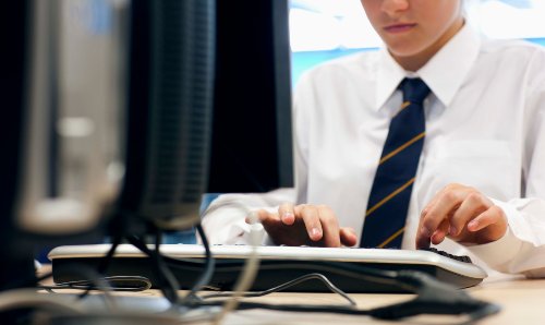 Student using a desktop computer