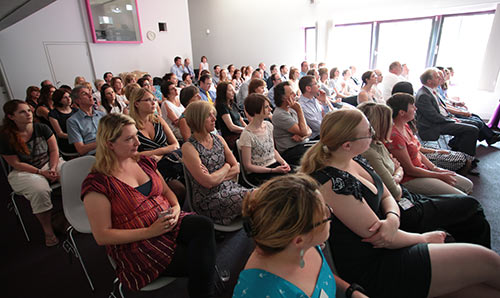 Public sat listening to a lecture