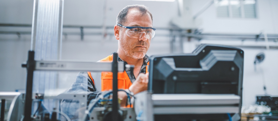 Electrical engineer in a factory