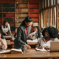 University academic helping student 