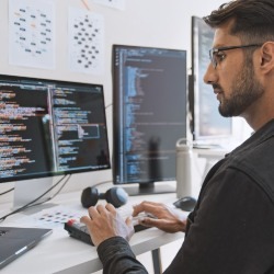 Man working on computer programme
