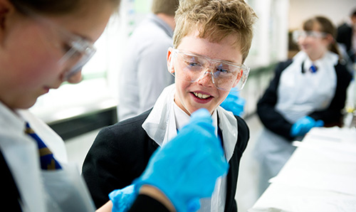 Children in University chemistry lab