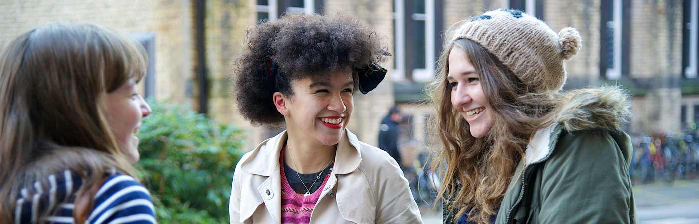 Two female students laughing