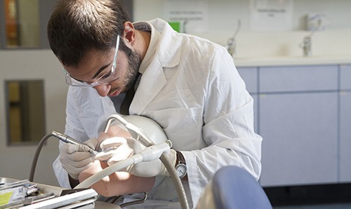 Researcher using scientific equipment