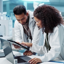Male and female scientist developing new health management interventions in the lab