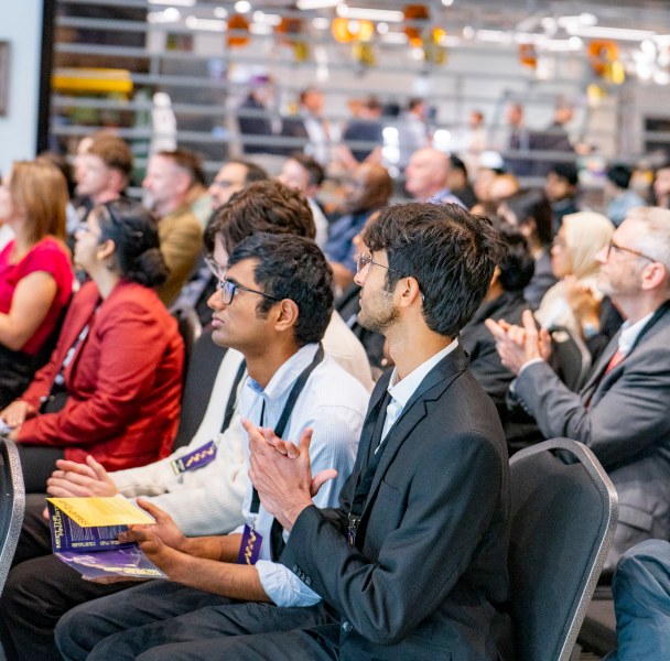 Innovation Festival audience members listening attentively.