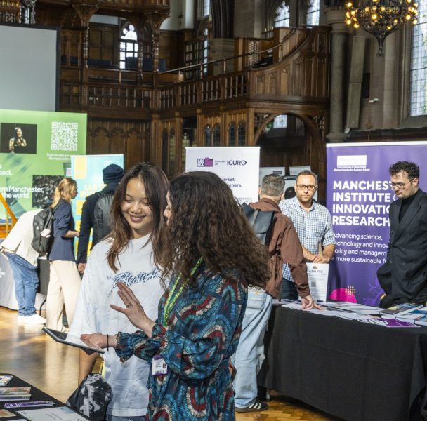 Diverse crowd browse tables