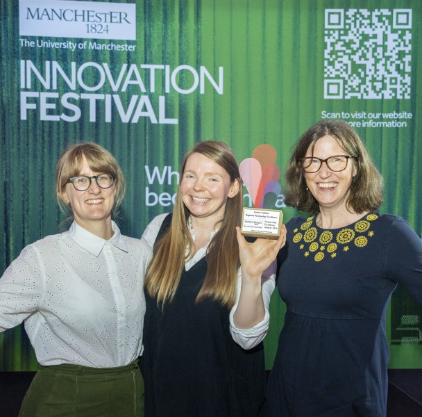 Three Partnership Excellence Awards winners celebrate.
