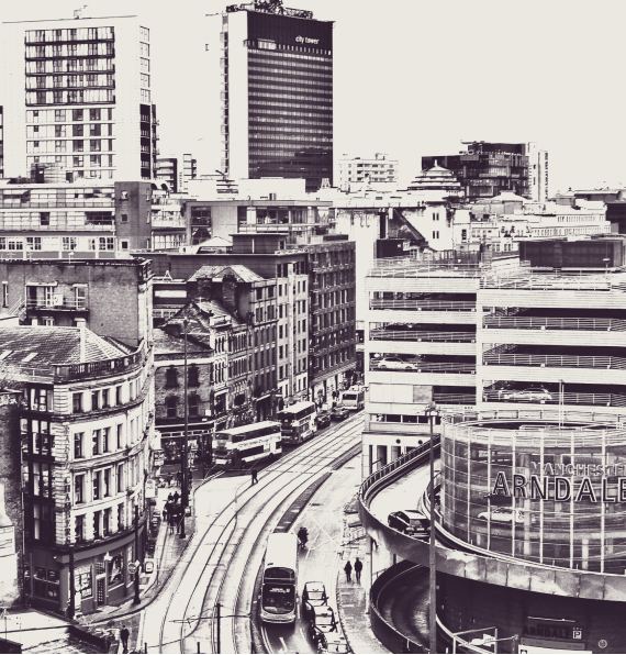 Black-and-white aerial view of Manchester.