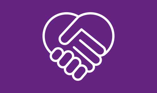 White icon of two hands meeting in the shape of a heart on a purple background