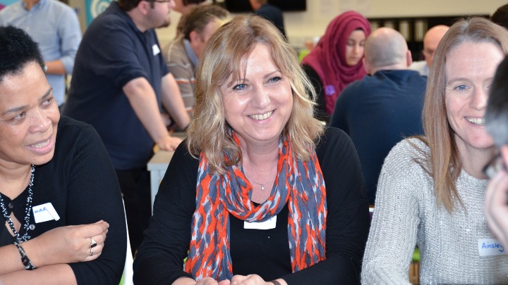 Women talking at a networking event