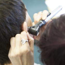 Boy having a hearing check