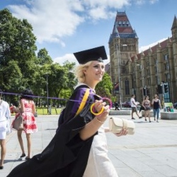 Student graduating with a balloon