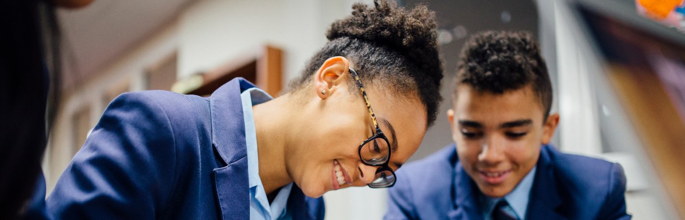 iStock image of two students working together