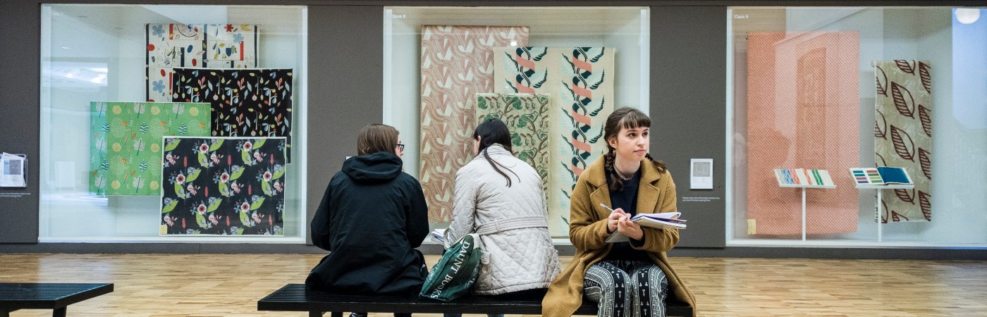 People enjoying an art exhibition at the Whitworth