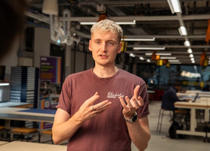 A student articulating to the camera
