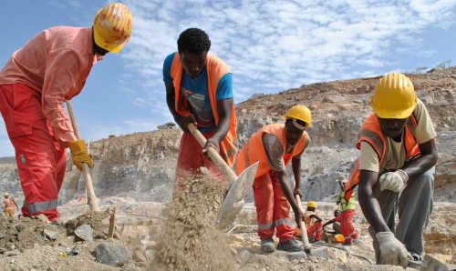 Men at work on the Grand Ethiopian Renaissance Dam project. (Jacey Fortin)