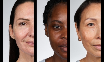 Close up of half the faces of three women.