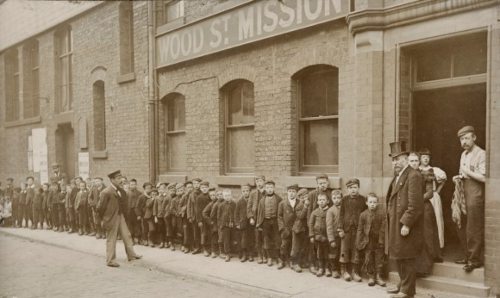 Children queuing outside of Wood Street Mission, Salford.