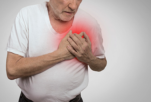 man having heart pain