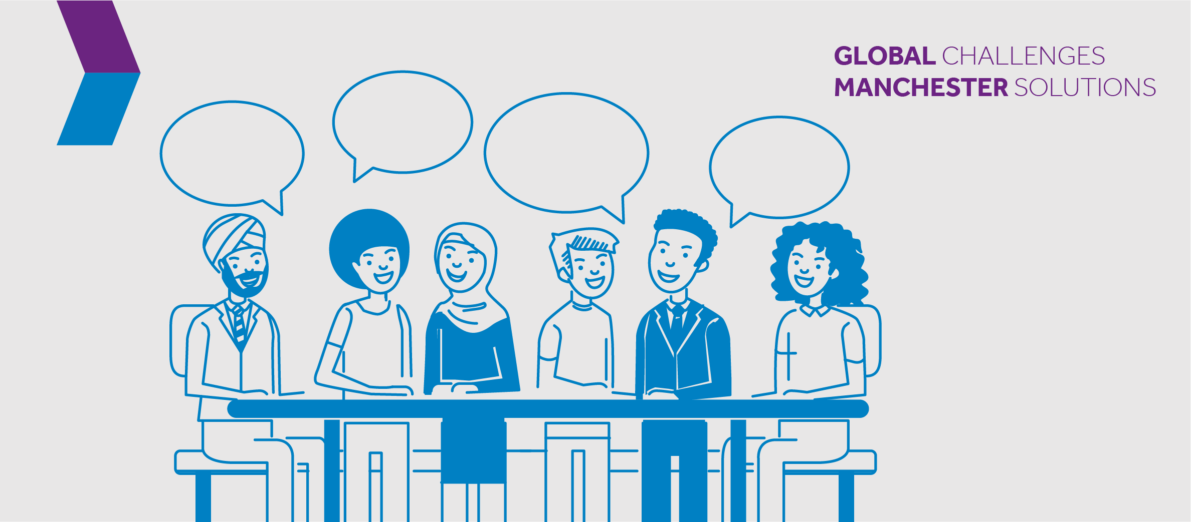 A diverse group of people talking around a large table.