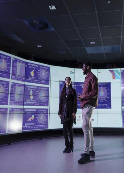 Two students in the data visualisation lab.
