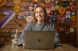 A student sat working on her laptop.