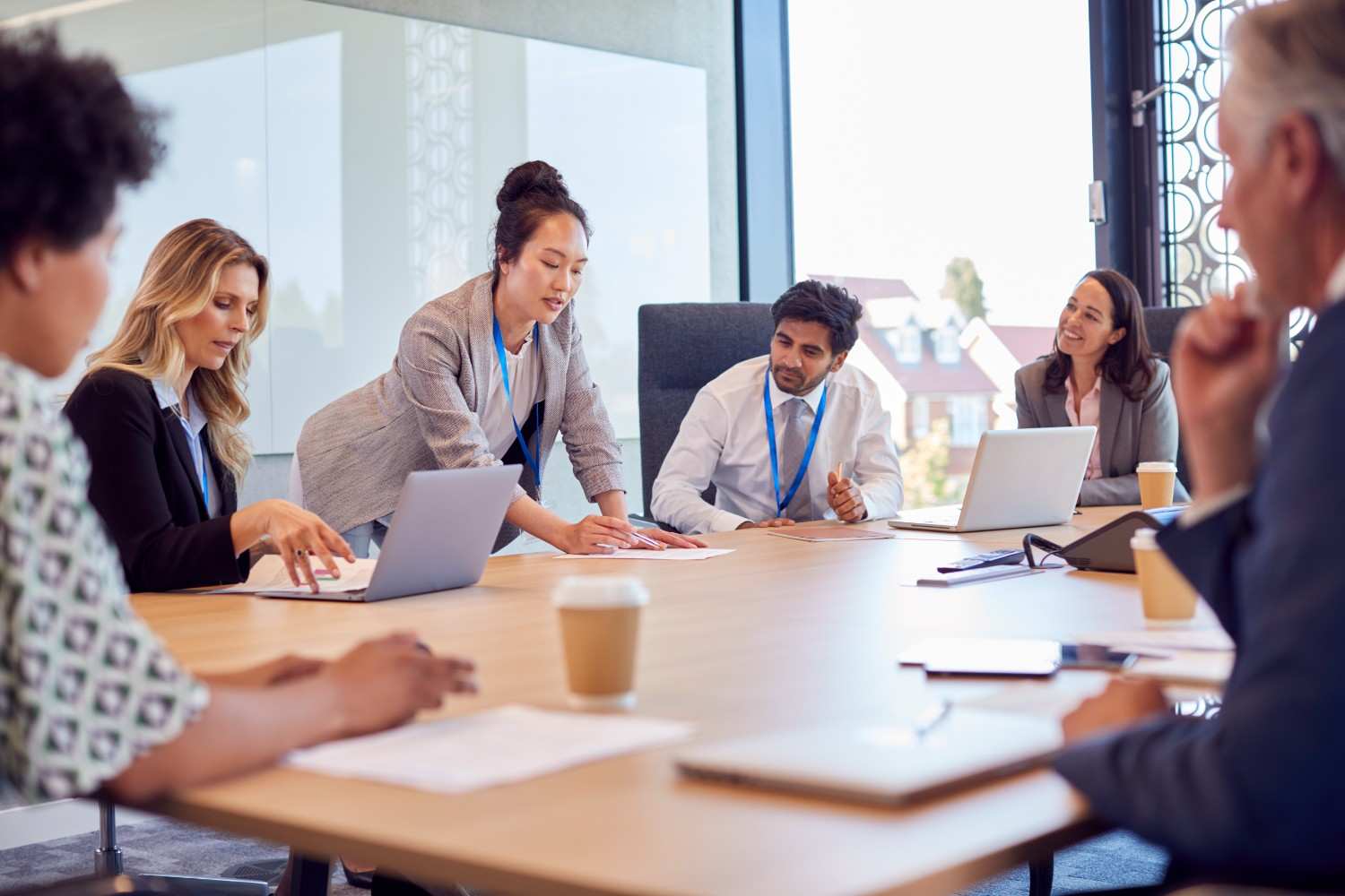 business woman leading multi cultural business team