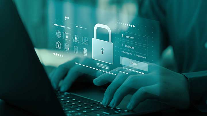 person's hands typying on a laptop, padlock, password field. 