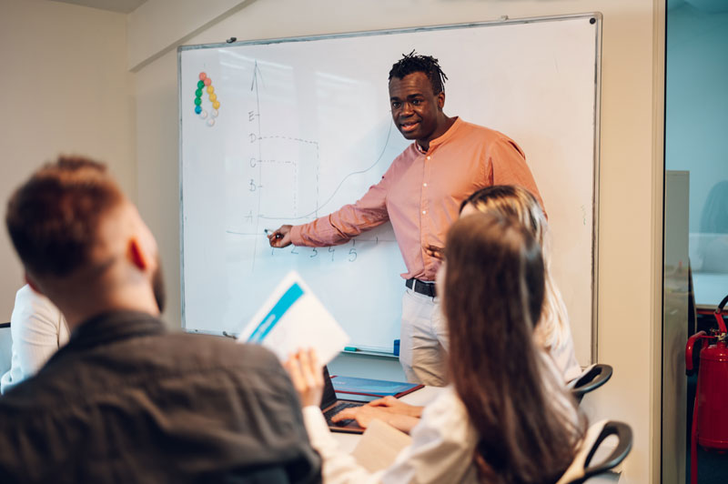 male teacher in classroom