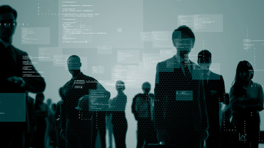people in front of a screen with text
