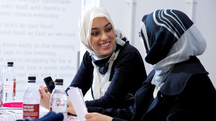 students talking to each other