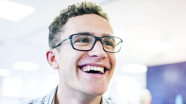 A smiling male medical student.