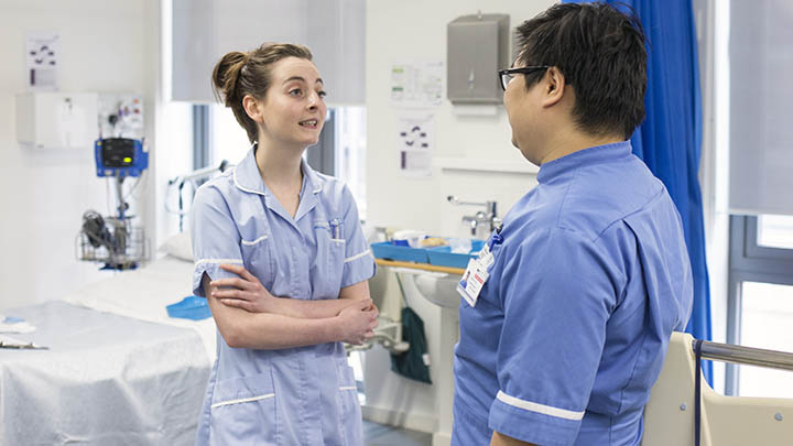 Nursing students in a ward.