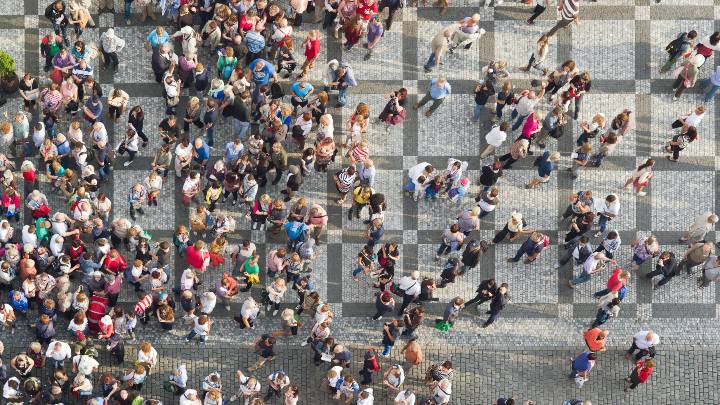 Bird’s eye view of a busy square of people.