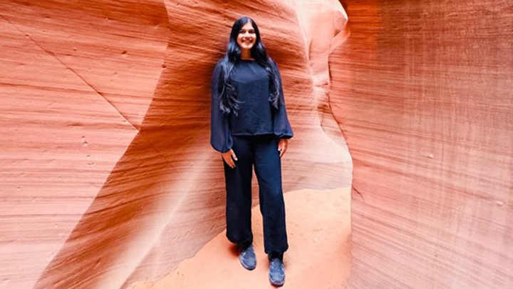 Biosciences student Sarah in a canyon.