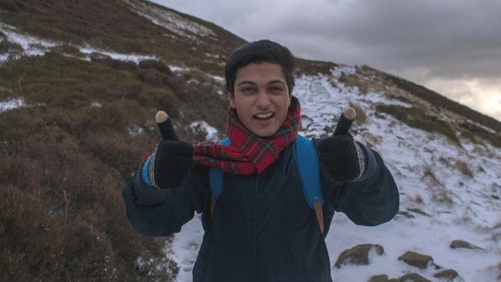 Student on a snowy mountain 