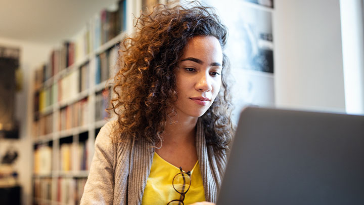 Female student working on a laptop