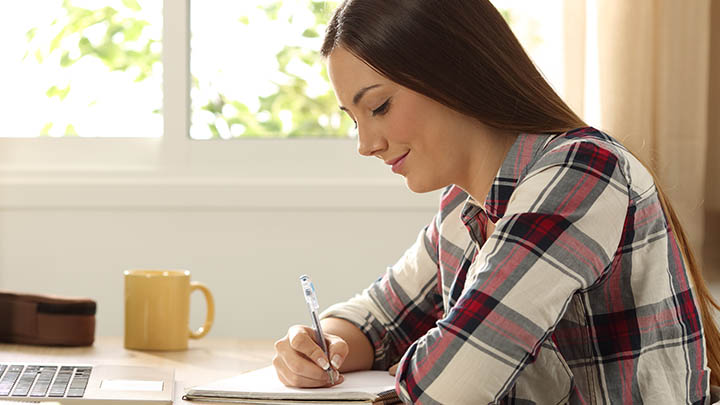 Female student at laptop